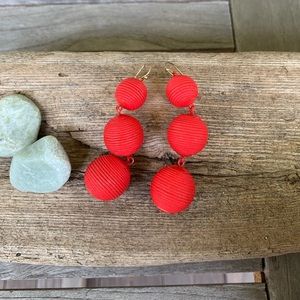 Big red ball earrings